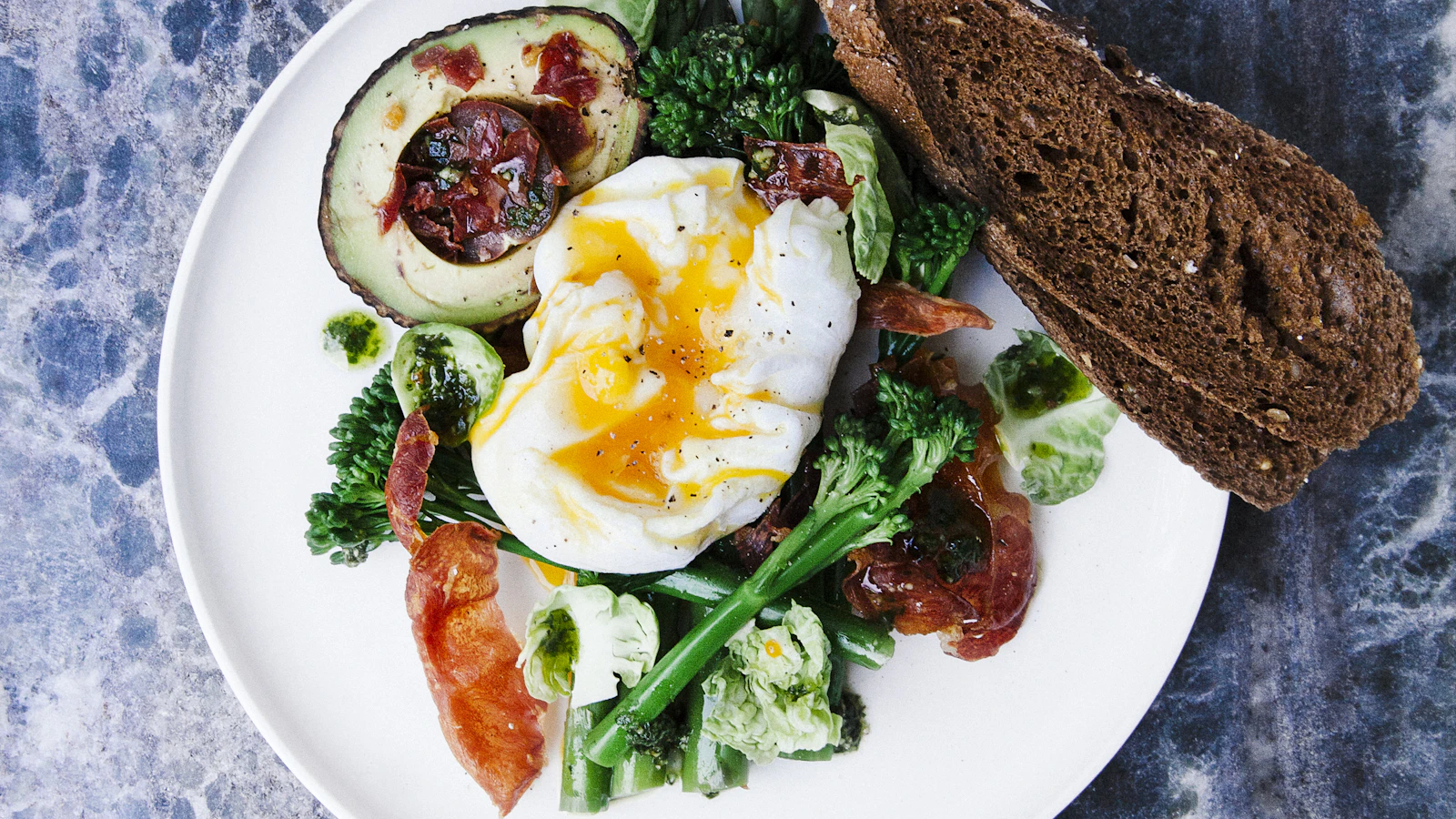 A plate with a fresh vegetable salad shot from above.