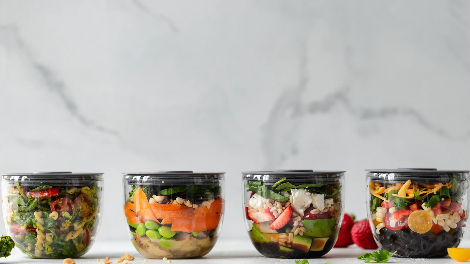 Meal prep containers with vegetables and protein portions.